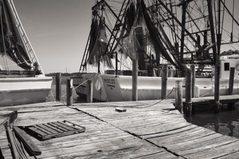 The Silent Fleet at the Wooden Pier